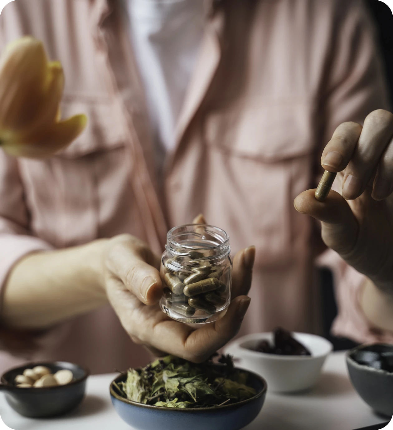 Herbal supplements and capsules on table